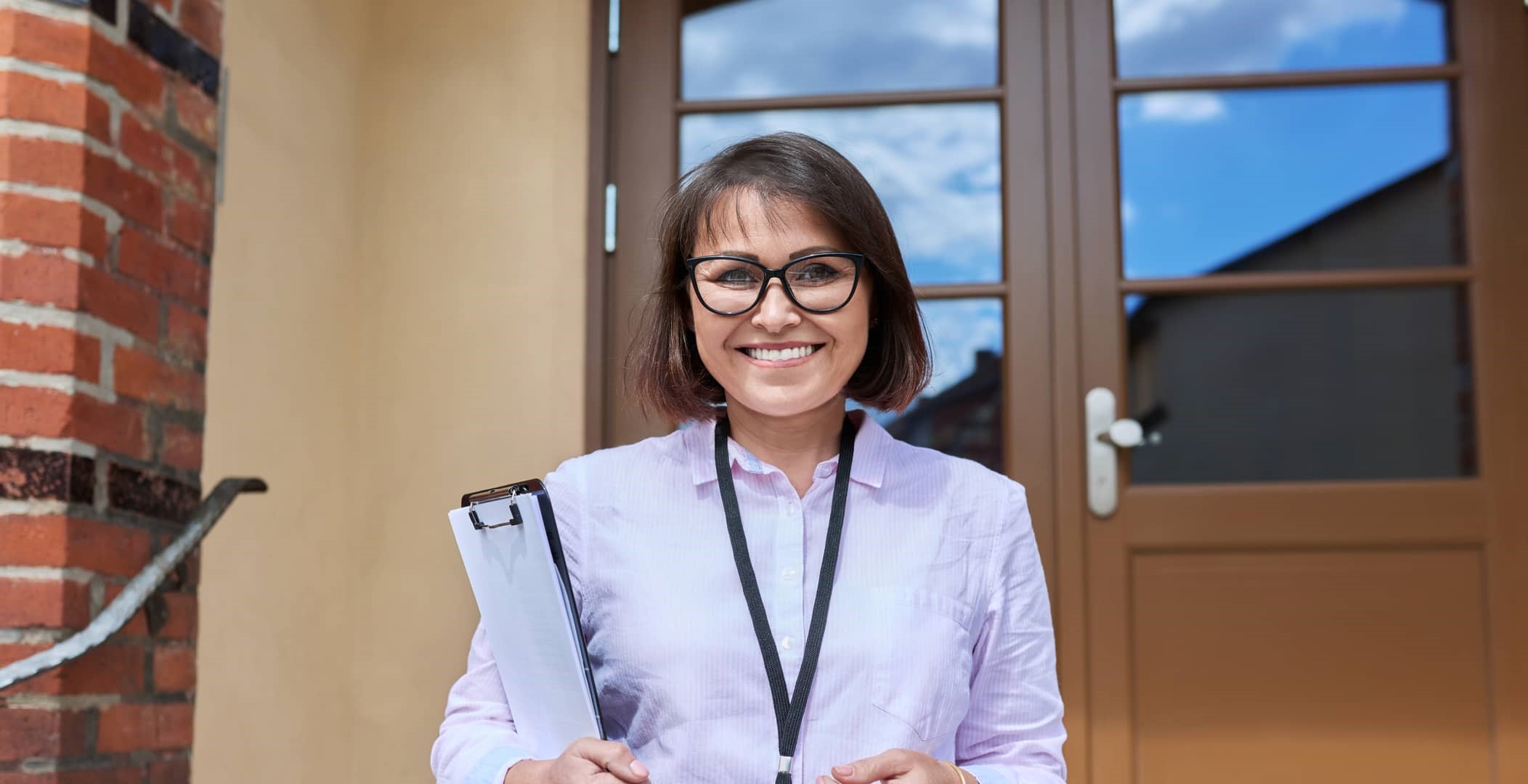 female social worker with clipboard female social worker with clipboard